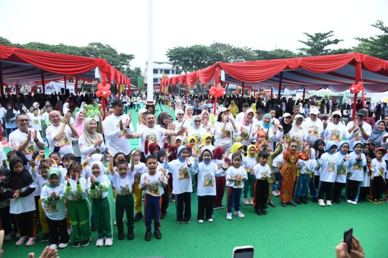 Bupati Kasmarni Dukung Komitmen Perlindungan Anak di Peringatan HAN 2025